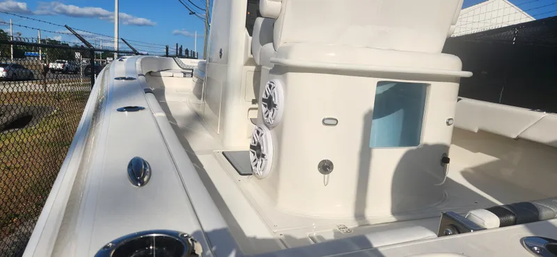 Slide: The Image of 2025 ShearWater 270 SS Open Carolina boat interior with speakers and seating. - 6