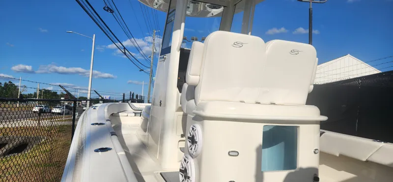 Slide: The Image of 2025 ShearWater 270 SS Open Carolina boat with sleek design and comfortable seating. - 7