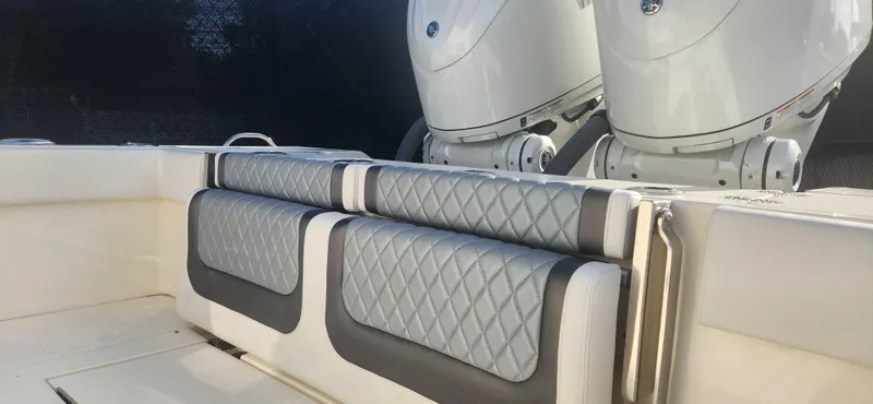 Slide: The Image of 2025 ShearWater 270 SS Open Carolina boat seating with dual engines. - 9