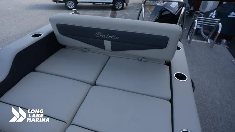 Slide: The Image of 2022 Barletta 24UE boat interior with cushioned seating at Long Lake Marina. - 14
