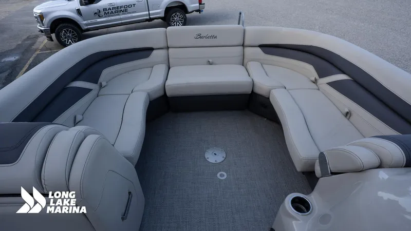 Slide: The Image of 2022 Barletta 24UE boat interior with spacious seating at Long Lake Marina. - 18