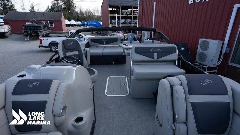 Slide: The Image of 2022 Barletta 24UE pontoon boat at Long Lake Marina, featuring spacious seating and modern design. - 19