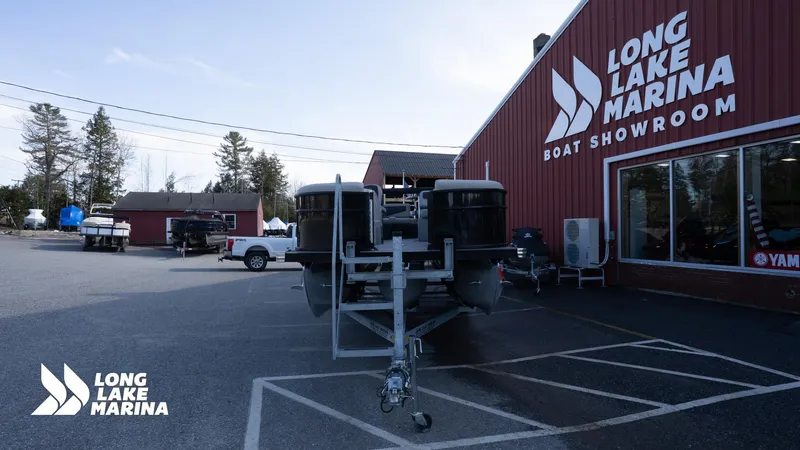 Slide: The Image of Barletta 24UE 2022 at Long Lake Marina showroom, outdoor display. - 5