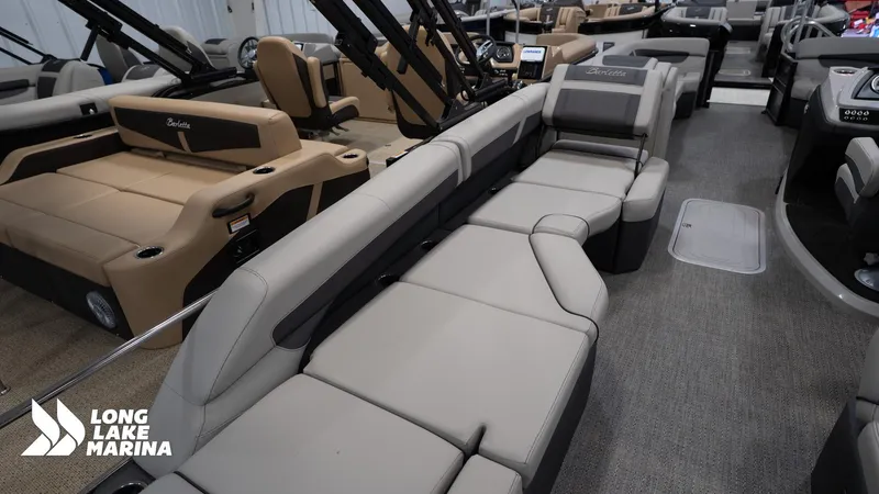 Slide: The Image of 2025 Barletta C24M pontoon boat interior with luxurious seating at Long Lake Marina. - 13