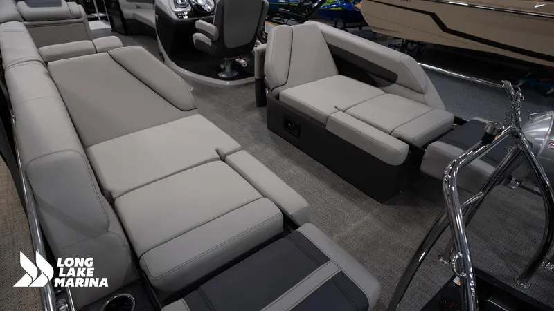 Slide: The Image of 2025 Barletta C24M pontoon boat interior with luxurious seating at Long Lake Marina. - 16