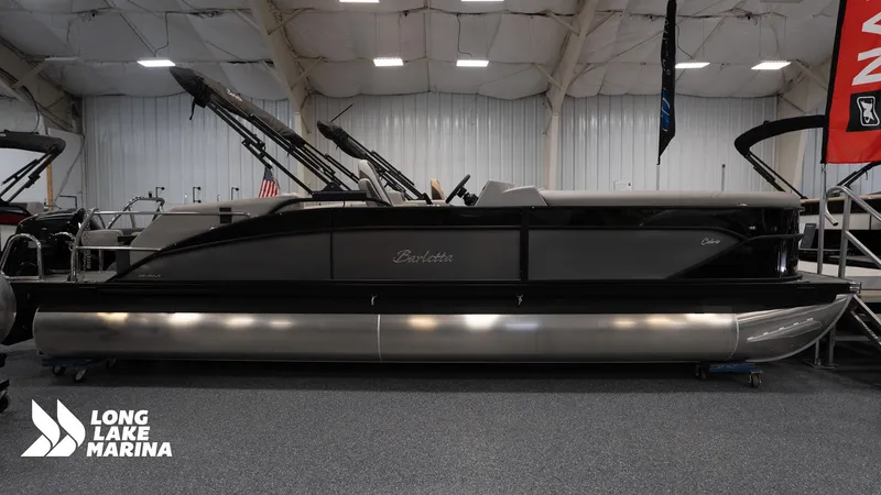 Slide: The Image of 2025 Barletta C24M pontoon boat displayed at Long Lake Marina indoors. - 7