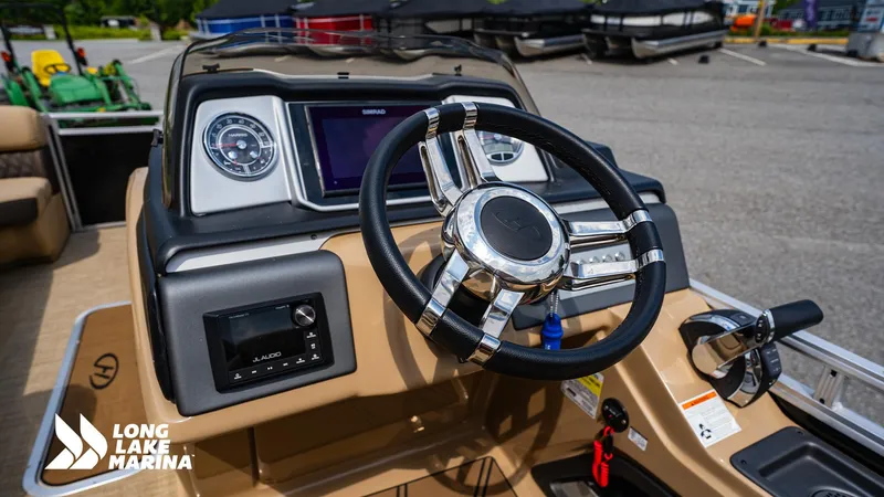 Slide: The Image of Steering console of 2022 Harris Solstice boat at Long Lake Marina. - 10