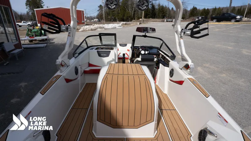 Slide: The Image of 2025 Nautique 200 boat interior with teak flooring at Long Lake Marina. - 9