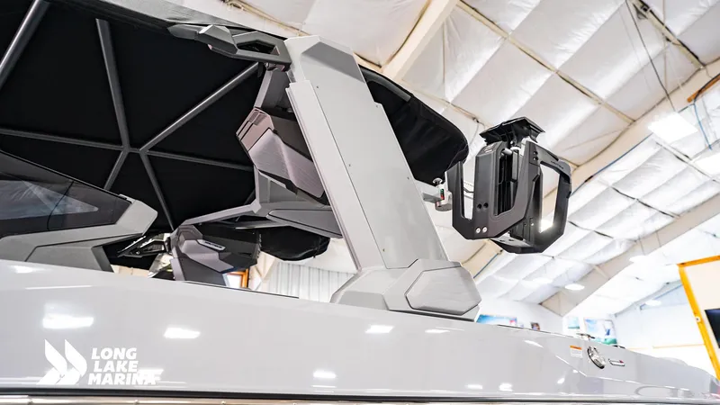 Slide: The Image of 2025 Nautique G23 boat with advanced tower design at Long Lake Marina. - 12