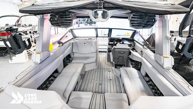 Slide: The Image of 2025 Nautique G23 boat interior with sleek seating and modern design at Long Lake Marina. - 3