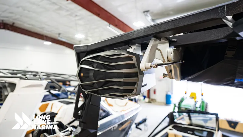 Slide: The Image of 2024 Nautique S21 boat speaker system in showroom at Long Lake Marina. - 6