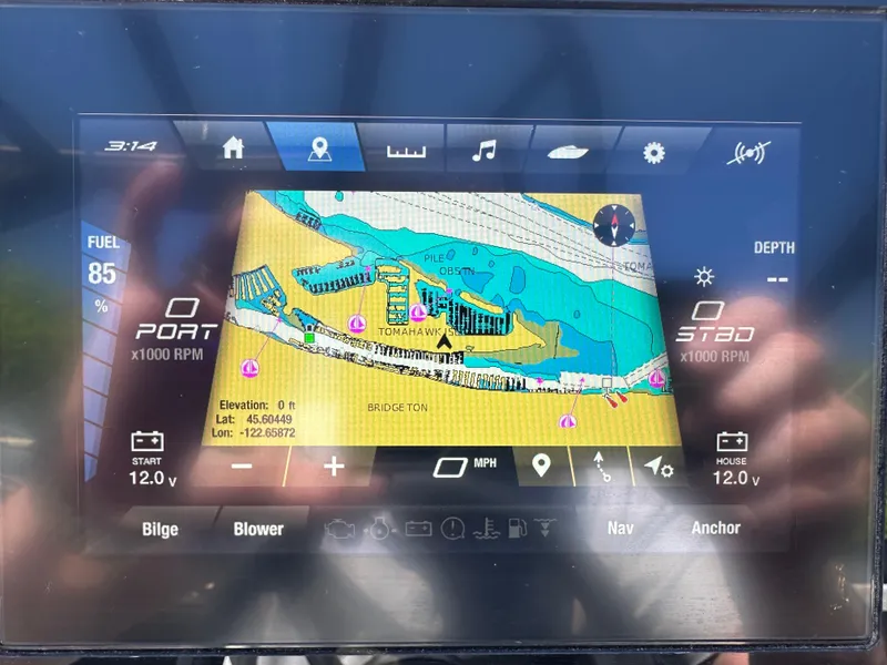 Slide: The Image of 2024 Yamaha AR250 boat navigation display showing map and system information. - 26