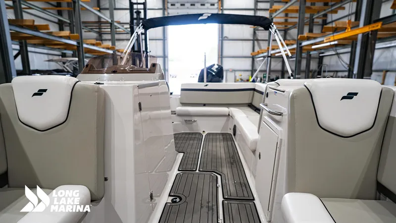 Slide: The Image of 2022 Starcraft SVX231 boat interior at Long Lake Marina, featuring sleek seating and modern design. - 6