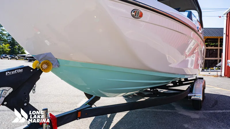 Slide: The Image of 2025 Yamaha Boats 222S on trailer at Long Lake Marina. - 13