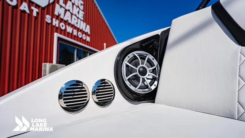 Slide: The Image of 2025 Yamaha Boats 222S speaker detail at Long Lake Marina showroom. - 15