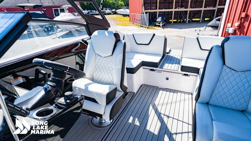 Slide: The Image of 2025 Yamaha Boats 222S interior with luxurious seating at Long Lake Marina. - 4