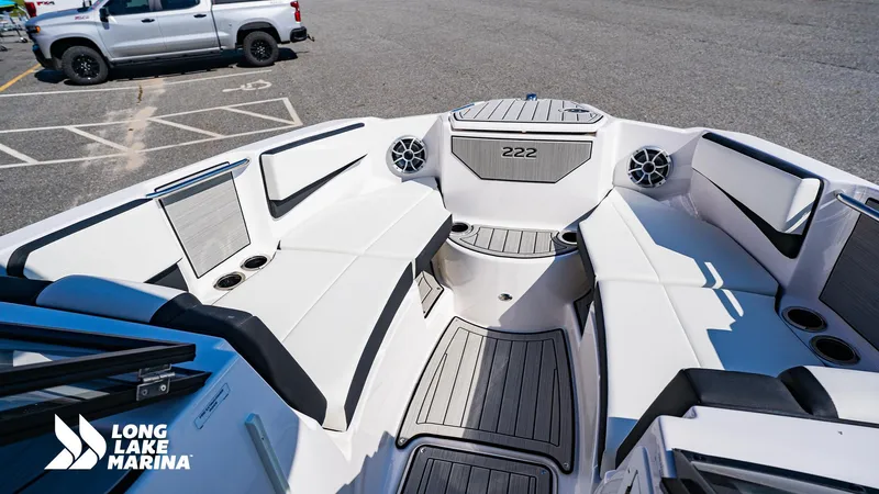 Slide: The Image of 2025 Yamaha Boats 222S interior with seating and speakers at Long Lake Marina. - 8