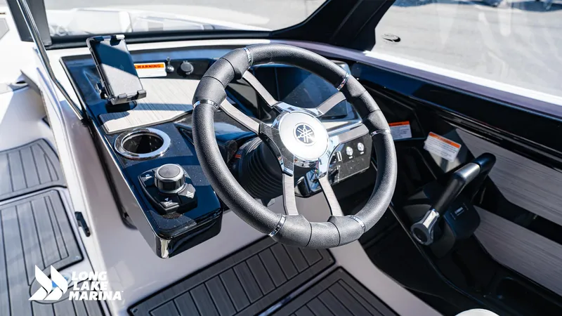 Slide: The Image of 2025 Yamaha Boats 222S steering console with modern controls and sleek design. - 9