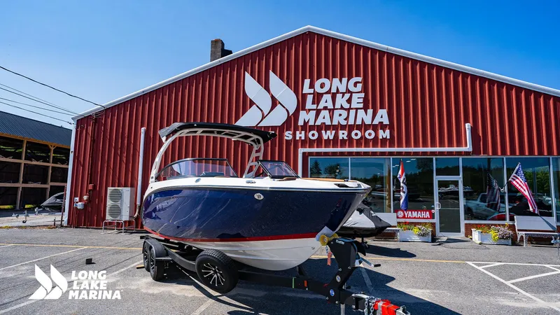 Slide: The Image of 2025 Yamaha Boats 252SD displayed at Long Lake Marina showroom. - 1