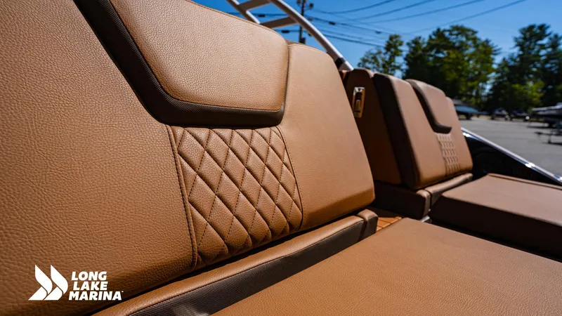 Slide: The Image of Luxurious brown seating on 2025 Yamaha Boats 252SD at Long Lake Marina. - 12