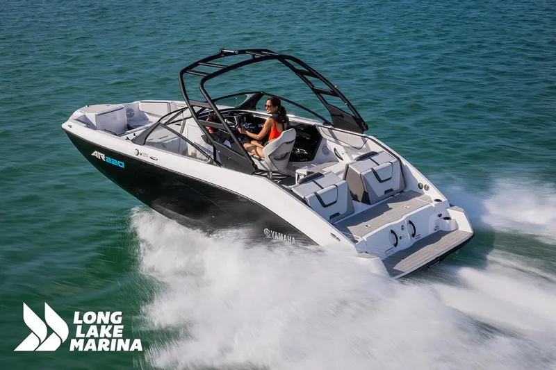 Slide: The Image of 2025 Yamaha AR220 boat cruising on water, featuring sleek design and modern amenities. - 5