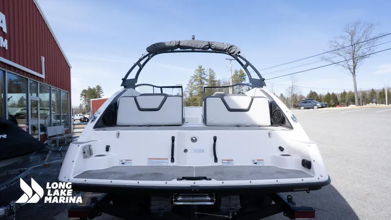 Slide: The Image of 2021 Yamaha AR250 boat at Long Lake Marina, rear view with seating and canopy. - 6