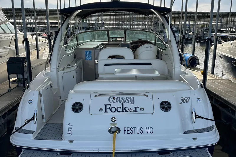 Slide: The Image of 2006 Sea Ray 360 Sundancer docked, rear view, with "Classy Focker" nameplate, Festus, MO. - 14