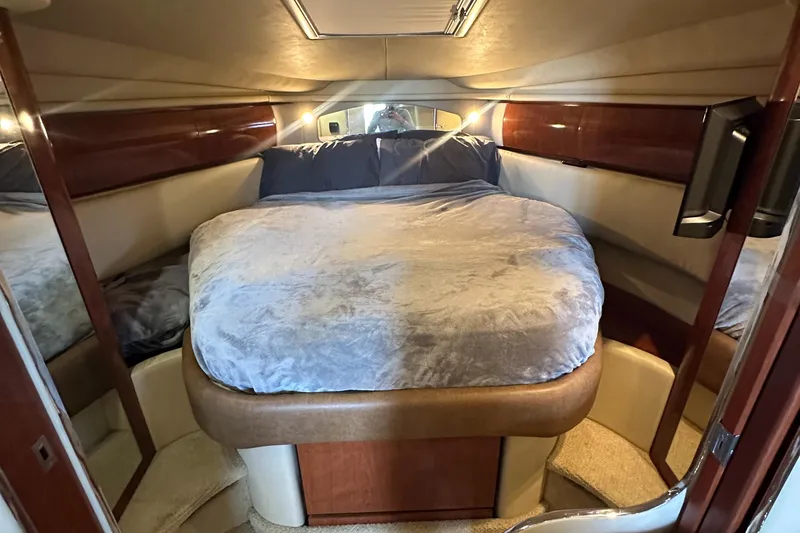 Slide: The Image of Luxurious cabin interior of 2006 Sea Ray 360 Sundancer yacht with cozy bed. - 38