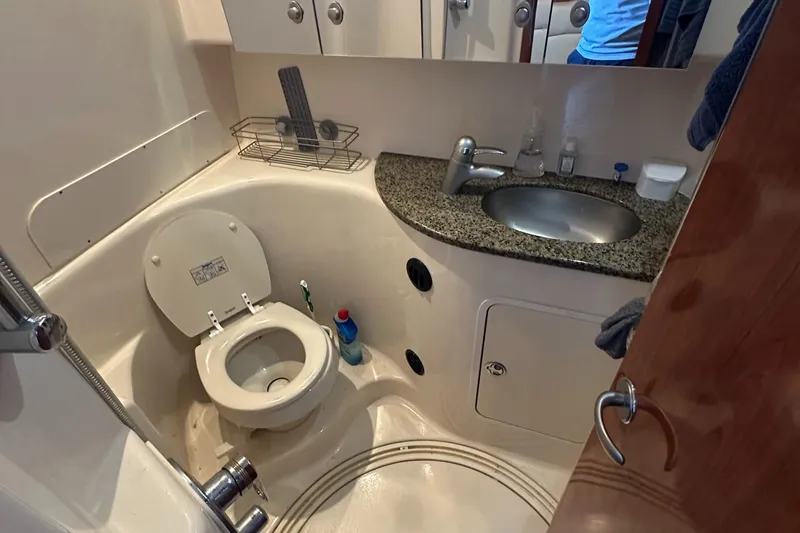 Slide: The Image of Compact bathroom in 2006 Sea Ray 360 Sundancer yacht with toilet and sink. - 40