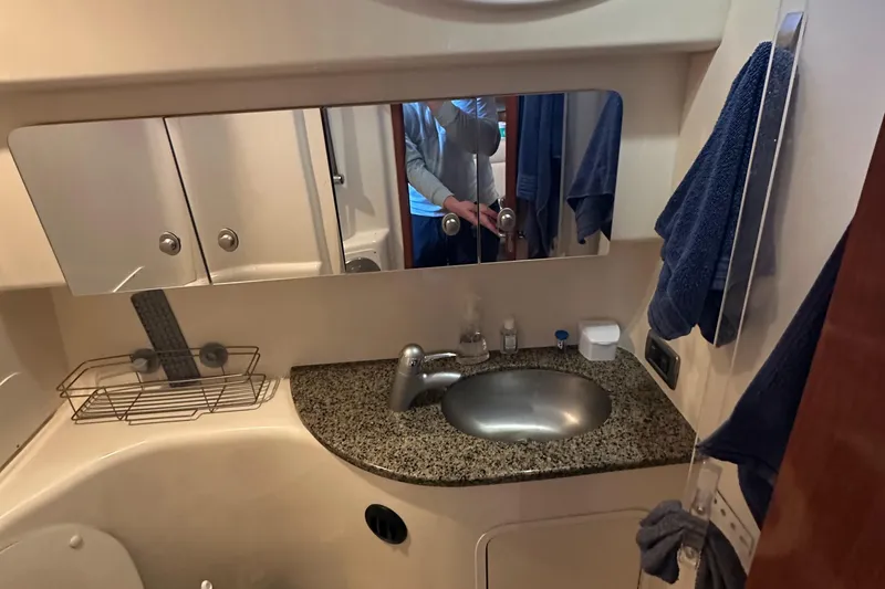 Slide: The Image of Bathroom interior of 2006 Sea Ray 360 Sundancer yacht with sink and mirror. - 41