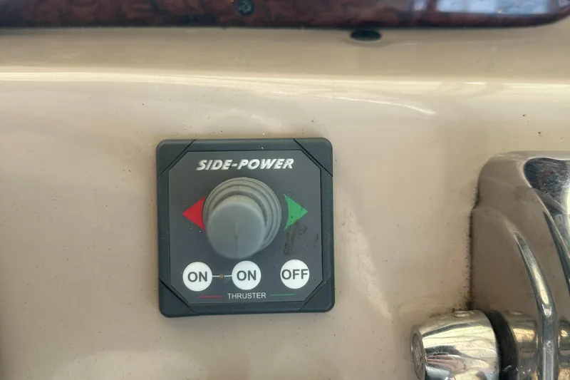 Slide: The Image of Side-Power thruster control on 2006 Sea Ray 360 Sundancer boat dashboard. - 9
