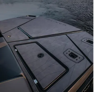 Slide: The Image of 2025 Manitou 22 CRUISE MAX boat deck, sleek design on calm water. - 5
