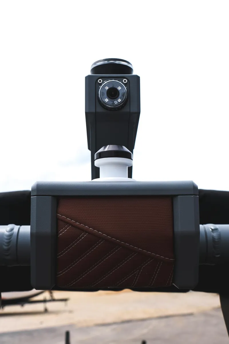 Slide: The Image of 2025 MasterCraft XStar 25 boat camera and handle detail, featuring sleek design elements. - 43