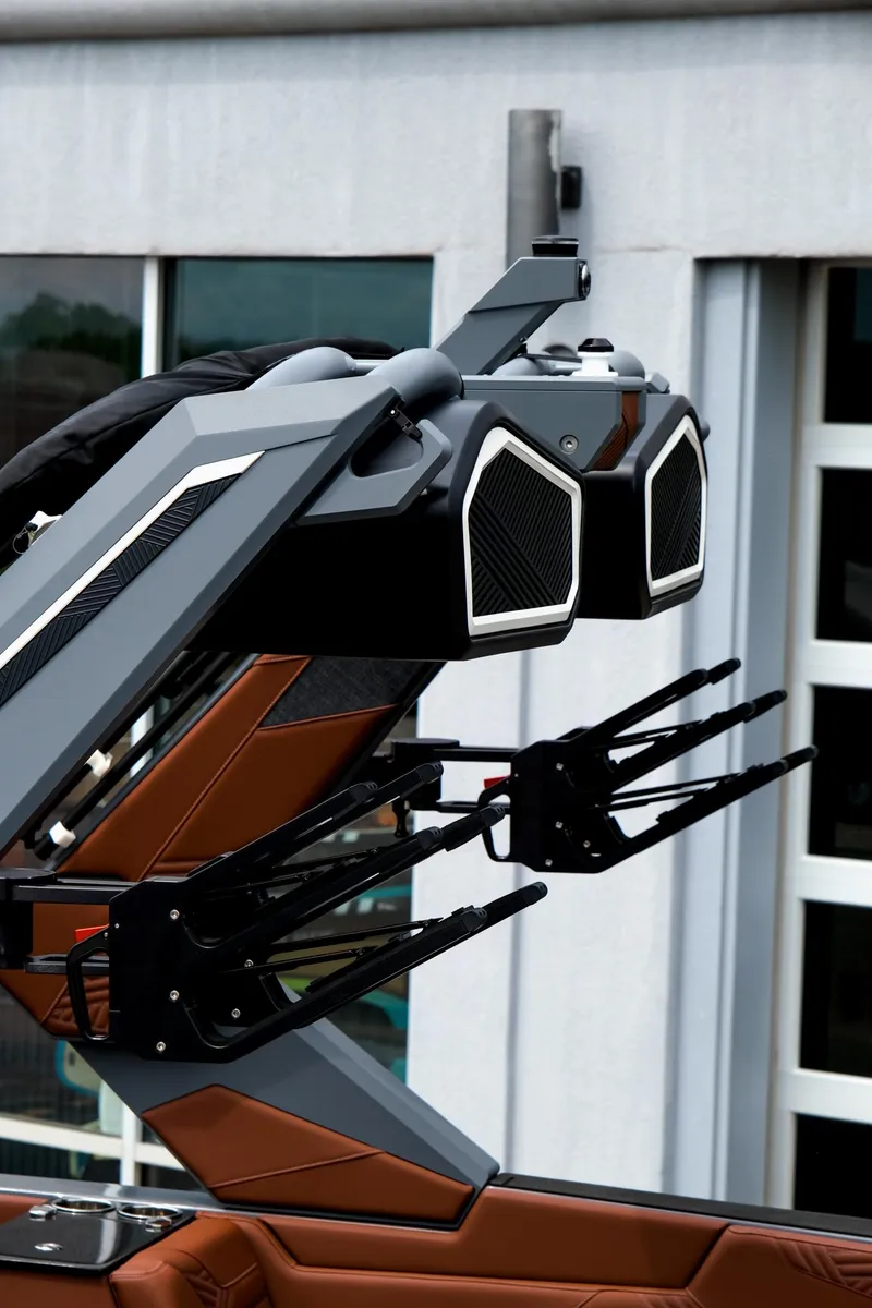 Slide: The Image of 2025 MasterCraft XStar 25 boat with advanced speaker system and sleek design. - 7