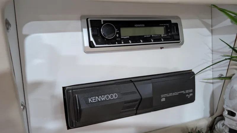 Slide: The Image of Kenwood stereo system in 2000 Regal 2860 Commodore boat interior. - 28
