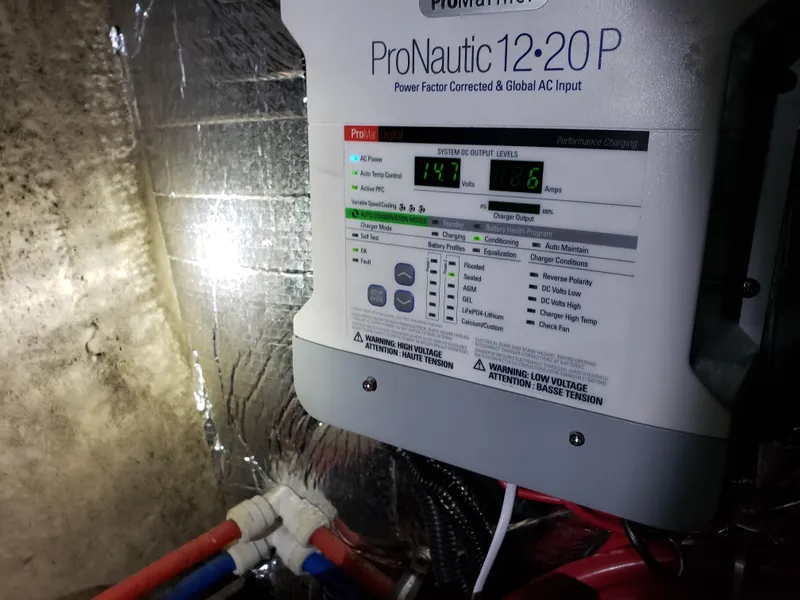 Slide: The Image of Battery charger in a 2000 Regal 2860 Commodore boat engine room. - 32