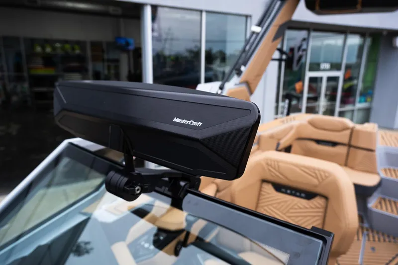 Slide: The Image of 2025 MasterCraft XStar 23 boat interior with advanced rearview mirror. - 28