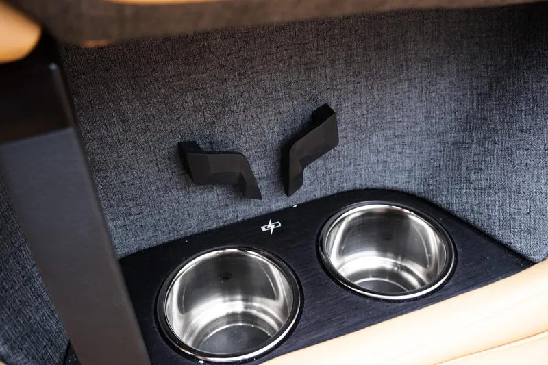 Slide: The Image of Cup holders in 2025 MasterCraft XStar 23 boat interior. - 36