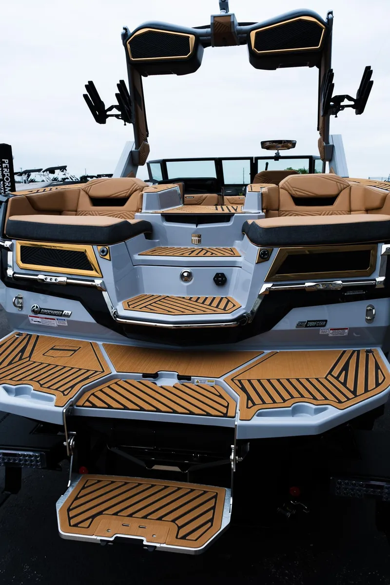 Slide: The Image of 2025 MasterCraft XStar 23 boat with luxurious seating and modern design. - 7
