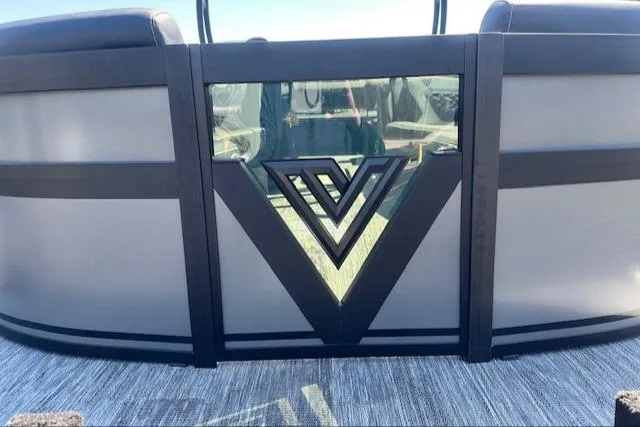 Slide: The Image of 2025 Viaggio Diamante S pontoon boat with sleek black design on a trailer. - 1