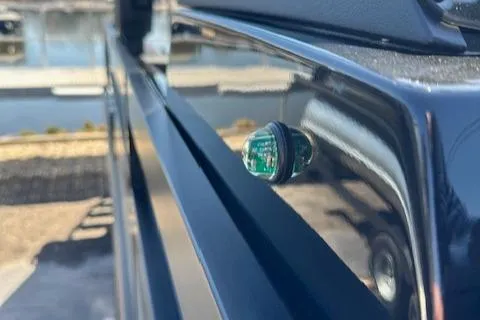 Slide: The Image of Close-up of a 2025 Viaggio Diamante S side marker light on a reflective surface. - 11