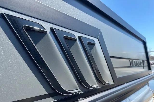Slide: The Image of 2025 Viaggio Diamante S boat with sleek design and distinctive logo on the deck. - 2