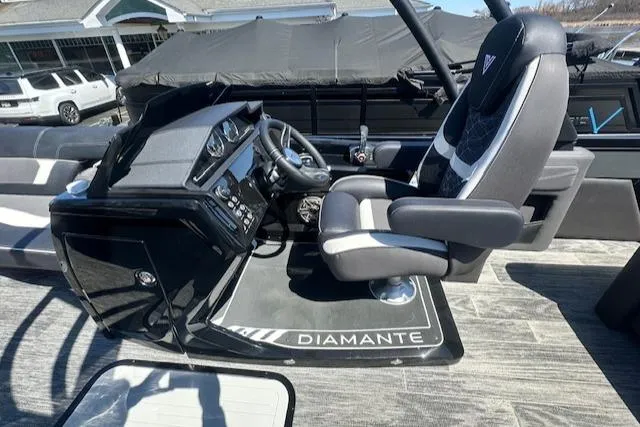 Slide: The Image of 2025 Viaggio Diamante S boat cockpit with modern steering and seating. - 27