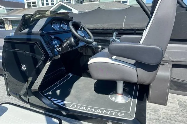 Slide: The Image of 2025 Viaggio Diamante S boat cockpit with steering wheel and control panel. - 30