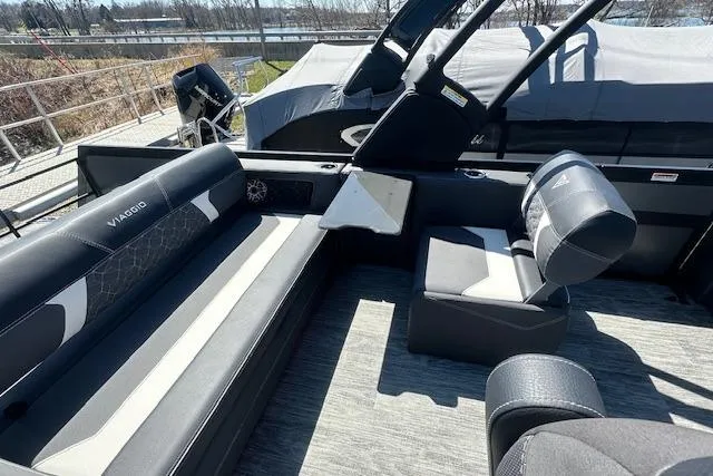 Slide: The Image of 2025 Viaggio Diamante S boat interior with sleek black seating and modern design. - 36