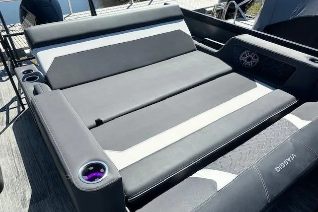 Slide: The Image of Luxurious 2025 Viaggio Diamante S boat seating with sleek gray upholstery and integrated cup holders. - 45