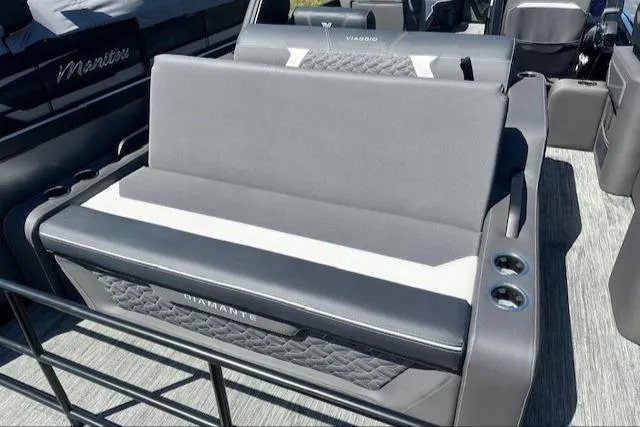 Slide: The Image of 2025 Viaggio Diamante S boat interior with gray seating and cup holders. - 46