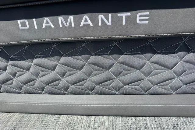 Slide: The Image of 2025 Viaggio Diamante S interior with geometric quilted design and embroidered branding. - 49
