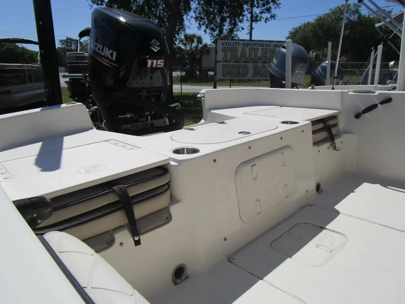 Slide: The Image of 2020 Carolina Skiff 19 LS boat interior with Suzuki 115 outboard motor. - 7