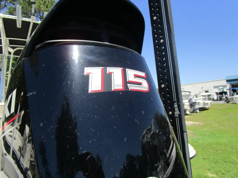 Slide: The Image of Close-up of a 115 HP outboard motor on a 2020 Carolina Skiff 19 LS boat. - 9